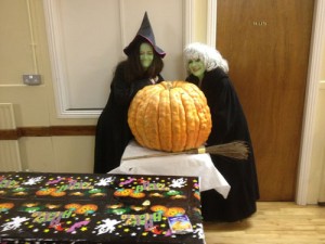 Witches watch the pumpkin